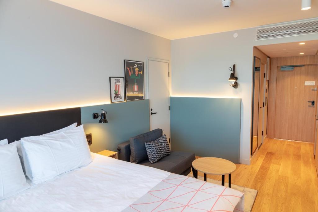 Postel nebo postele na pokoji v ubytování Holiday Inn Helsinki - Expo by IHG