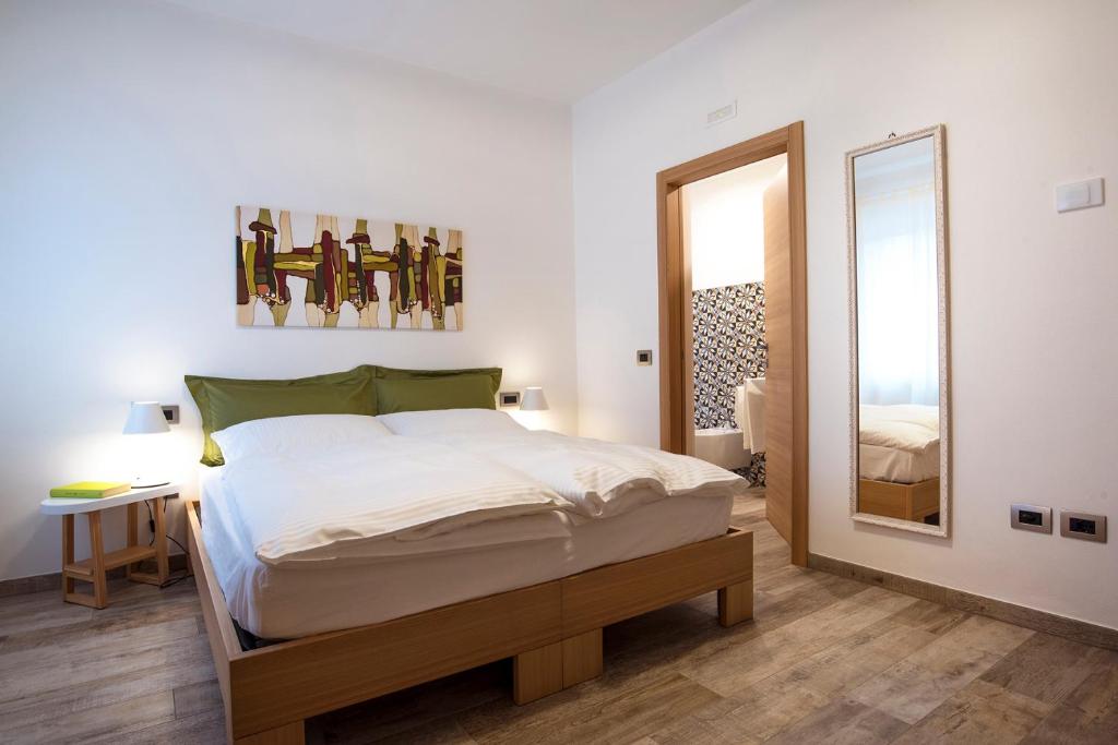 Posteľ alebo postele v izbe v ubytovaní B&B Pra da Lares