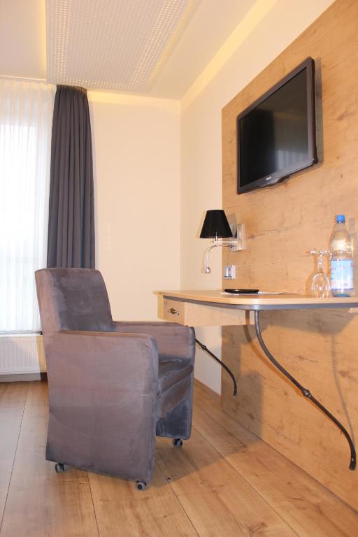 TV a/nebo společenská místnost v ubytování SOLEWERK Hotel