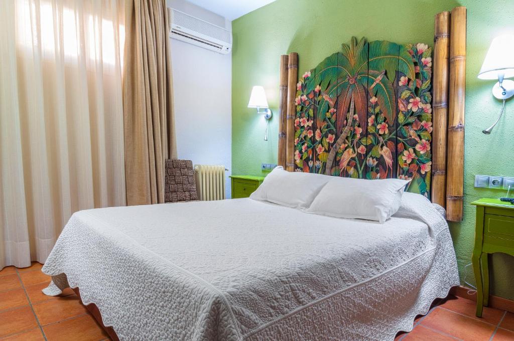 Postel nebo postele na pokoji v ubytování Hotel Sierra de Cazorla & SPA 3*