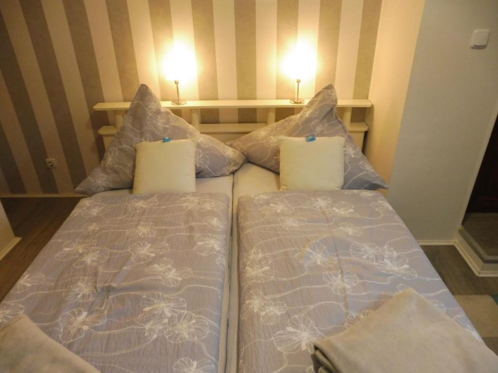 Postel nebo postele na pokoji v ubytování Haus Schwalbennest