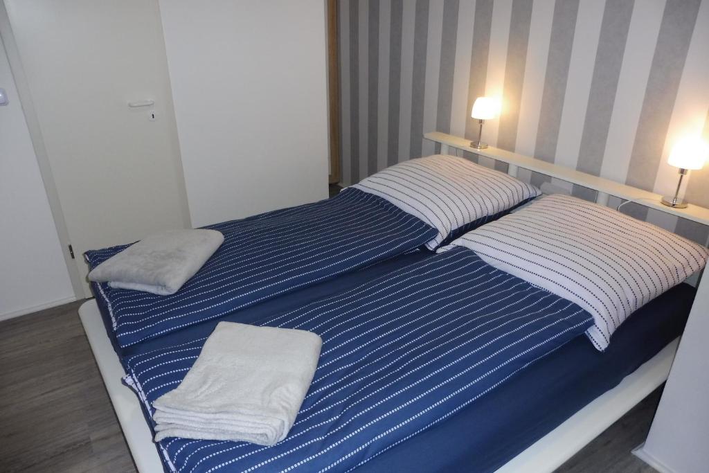 Postel nebo postele na pokoji v ubytování Haus Schwalbennest
