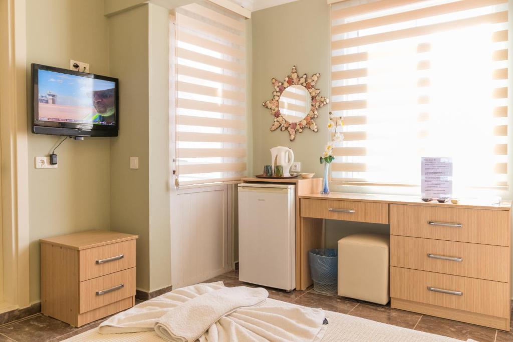 TV a/nebo společenská místnost v ubytování Hotel Dost