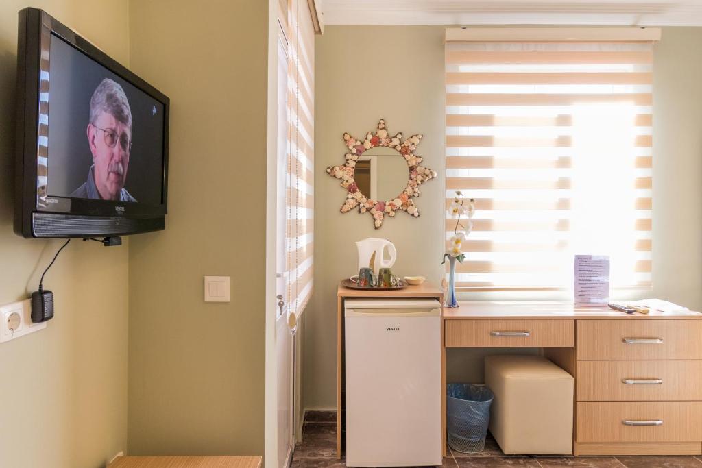 TV a/nebo společenská místnost v ubytování Hotel Dost