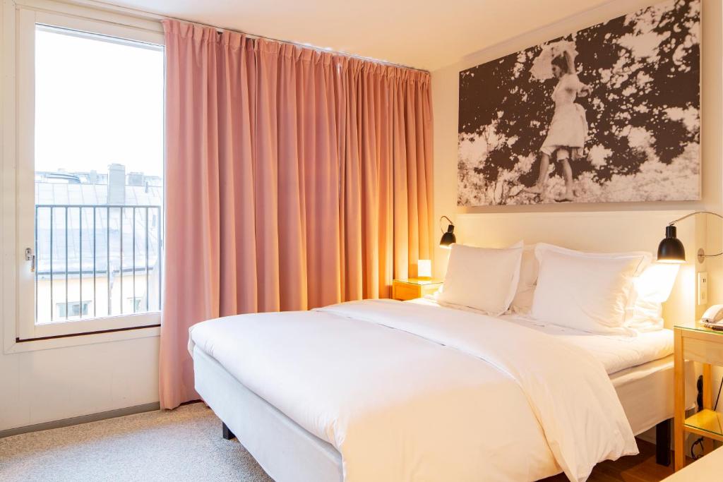 Postel nebo postele na pokoji v ubytování Hotel Rival