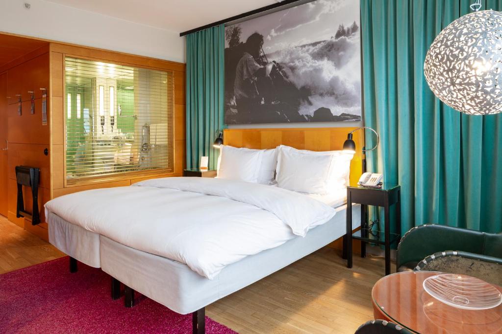 Postel nebo postele na pokoji v ubytování Hotel Rival