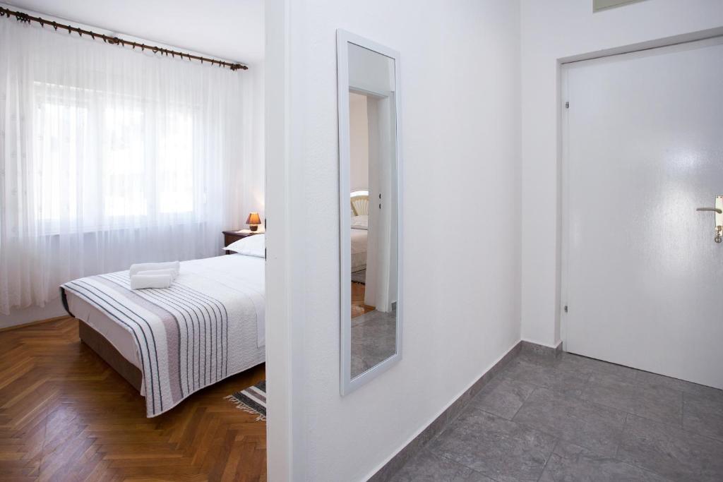 Posteľ alebo postele v izbe v ubytovaní Apartment Blaž