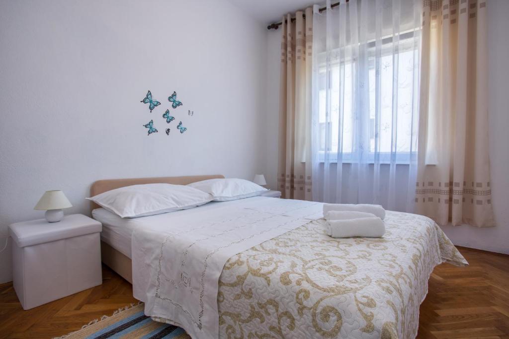 Posteľ alebo postele v izbe v ubytovaní Apartment Blaž