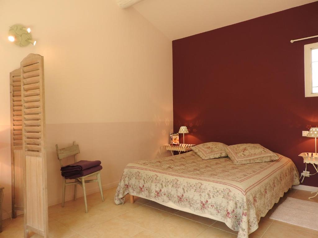 Letto o letti in una camera di Le Mas de l'Escaillon