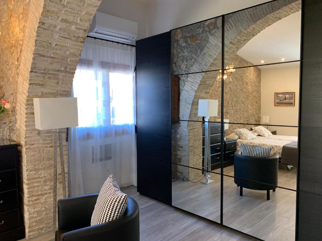 Posteľ alebo postele v izbe v ubytovaní PINTOR MASSANET - Casa de piedra adaptada en LEscala