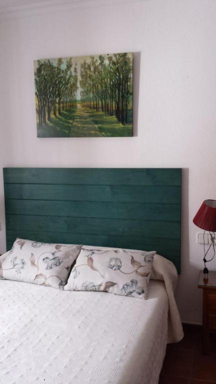 Postel nebo postele na pokoji v ubytování Pensión Venta Julián HCA01134