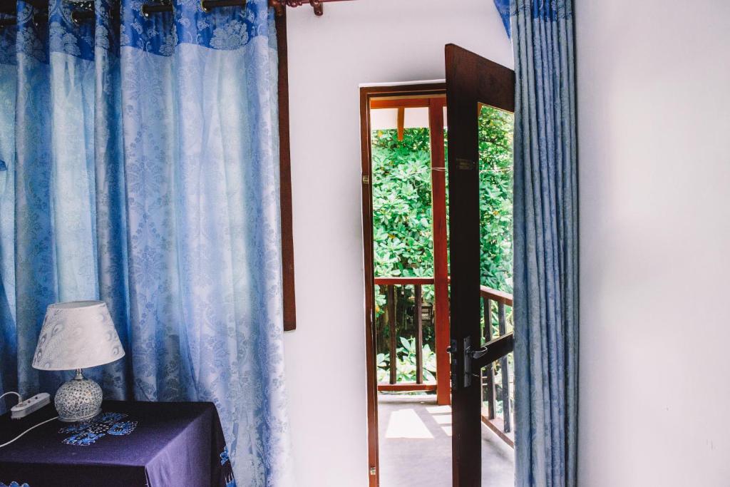 Balkón nebo terasa v ubytování Kadolana Guest House