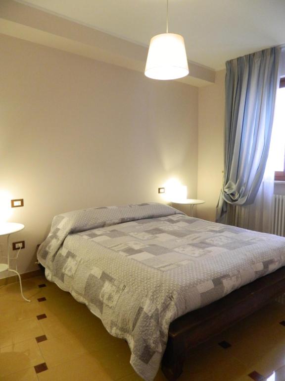 Postel nebo postele na pokoji v ubytování Il Vicoletto
