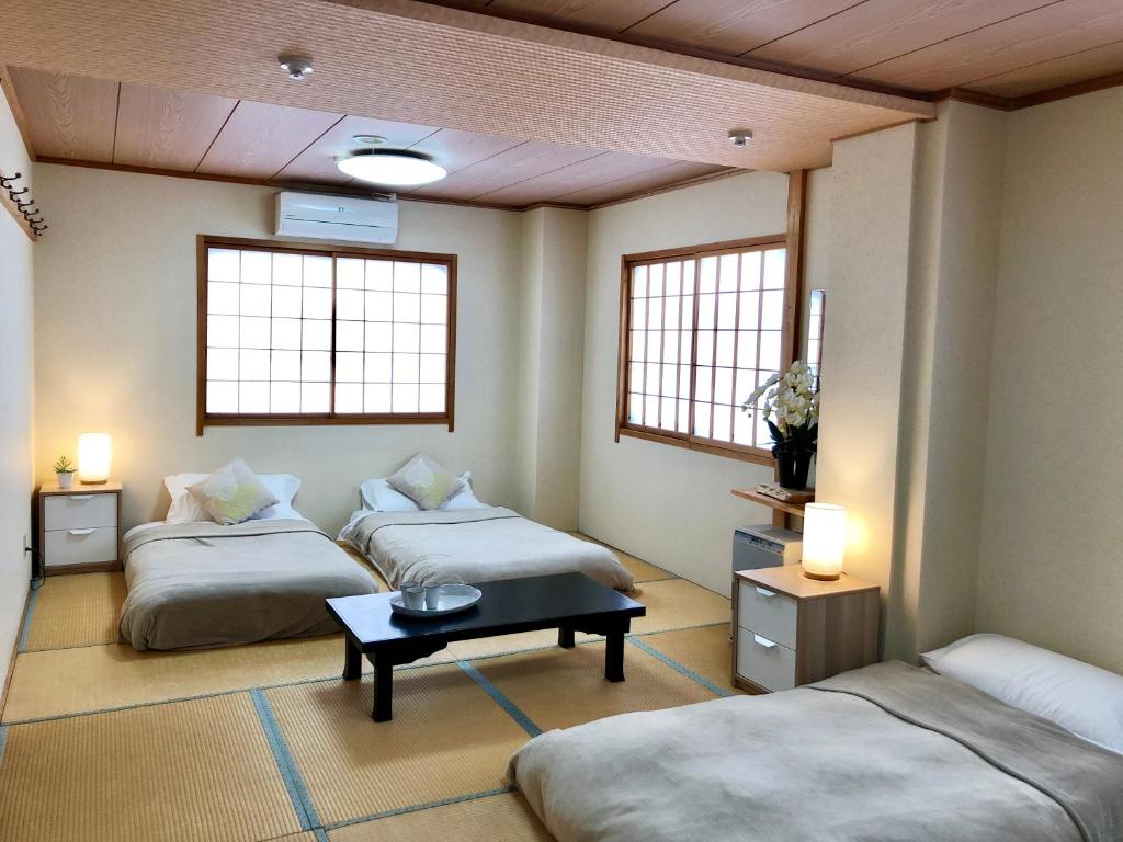 Cama o camas de una habitación en Akakura Akarien