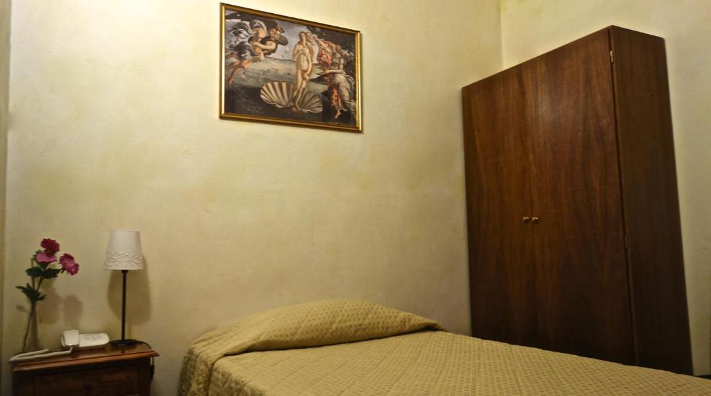 Posteľ alebo postele v izbe v ubytovaní Hotel Bologna