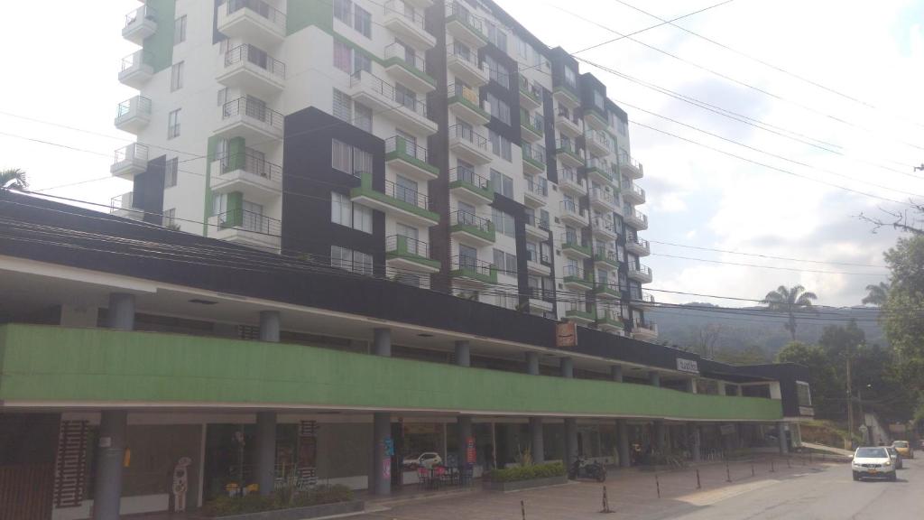 a large apartment building with a street in front of it at Apartamento Moniquira in Moniquirá