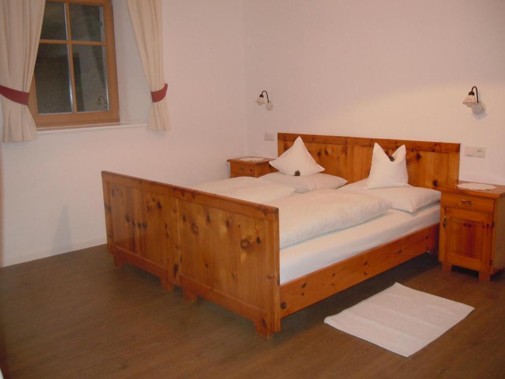 Postel nebo postele na pokoji v ubytování Feldererhof
