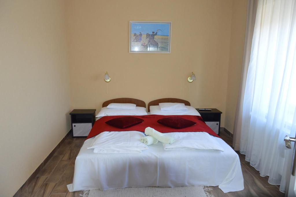 Posteľ alebo postele v izbe v ubytovaní Varga Apartman Hévíz