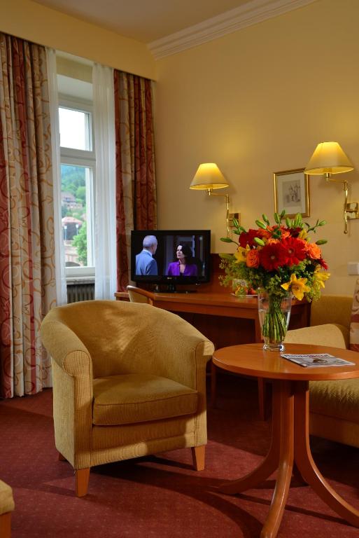 TV a/nebo společenská místnost v ubytování City Partner Hotel Holländer Hof
