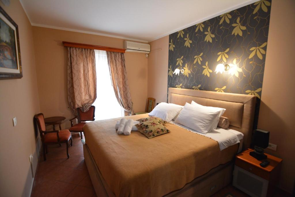 Postel nebo postele na pokoji v ubytování Apartments Bogdanovic