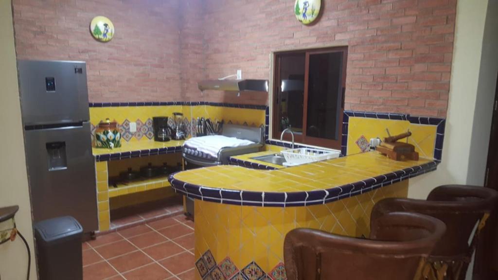 Kuchyň nebo kuchyňský kout v ubytování Casa palmito cerca de la playa