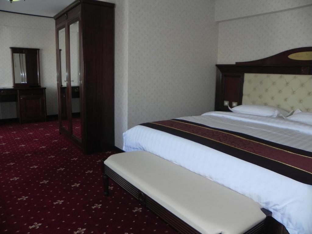 Postel nebo postele na pokoji v ubytování Hestia Hotel