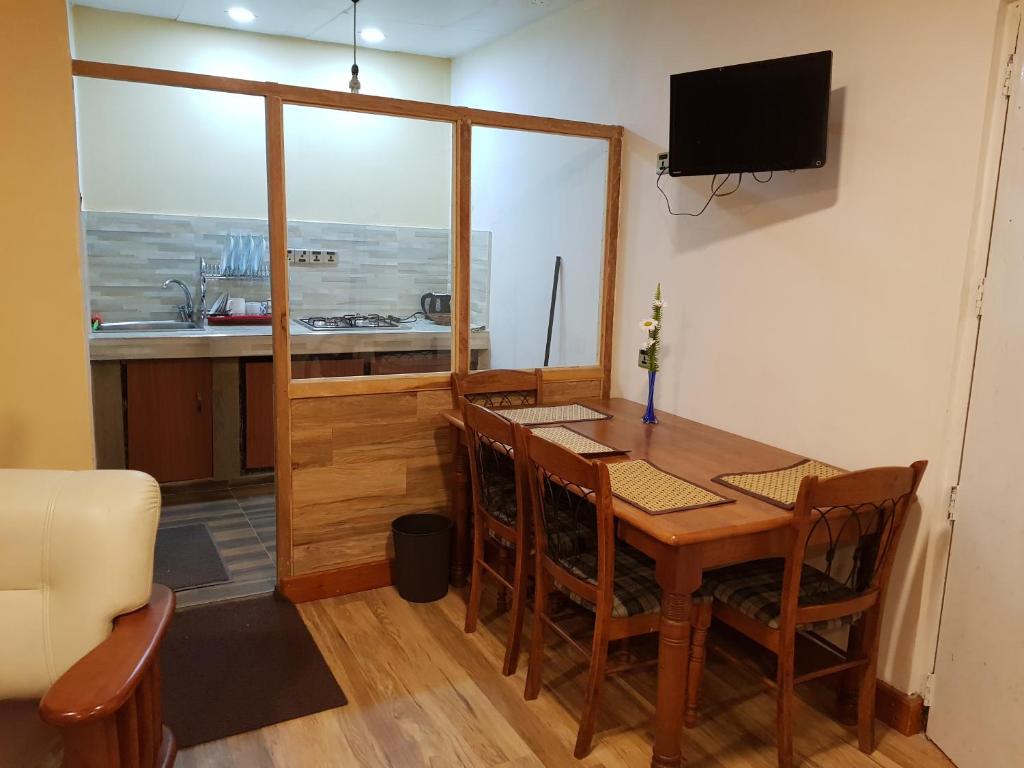 TV a/nebo společenská místnost v ubytování Mahoteak Home Stay