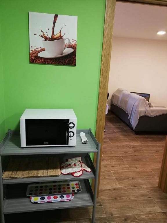 Postel nebo postele na pokoji v ubytování Casa rural Camelle Casa dos avós