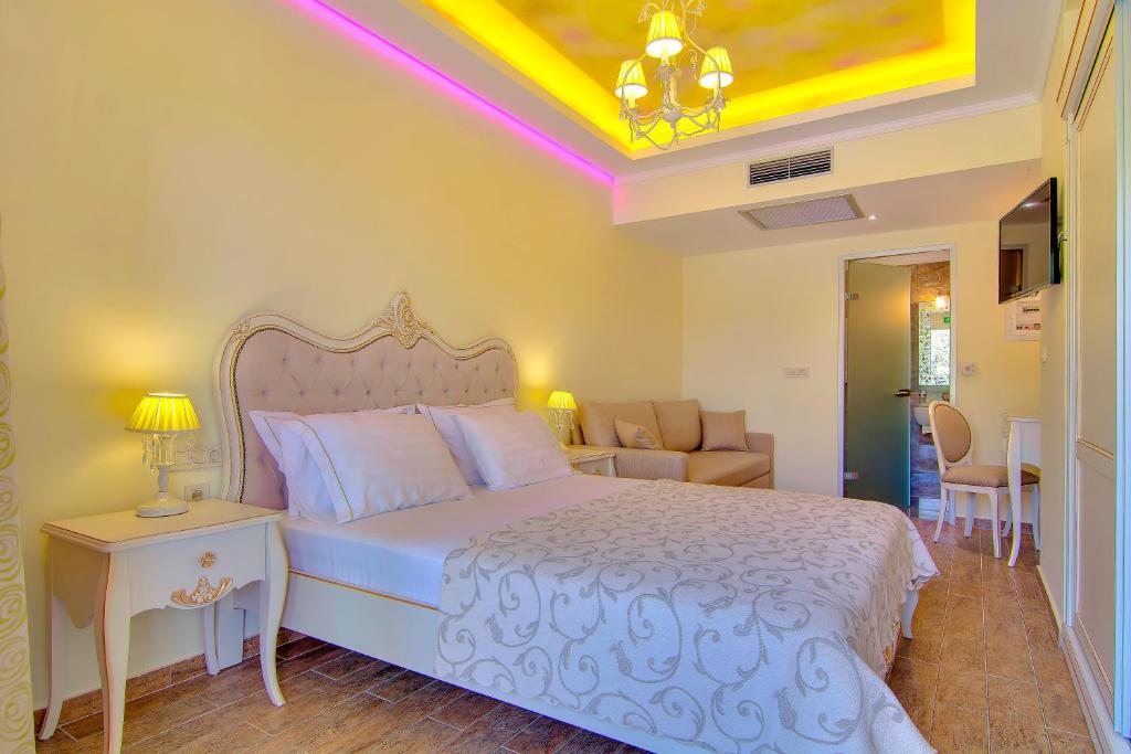 Voodi või voodid majutusasutuse Hotel Parga Princess toas