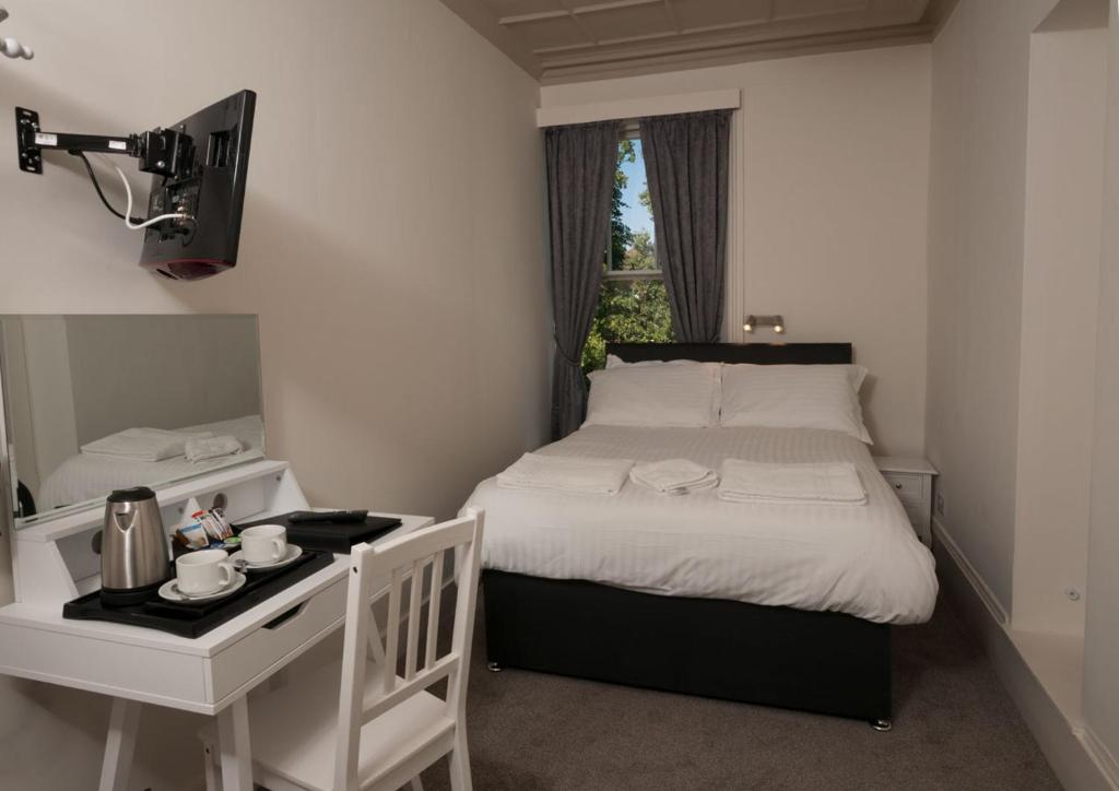 Postel nebo postele na pokoji v ubytování Dawson House