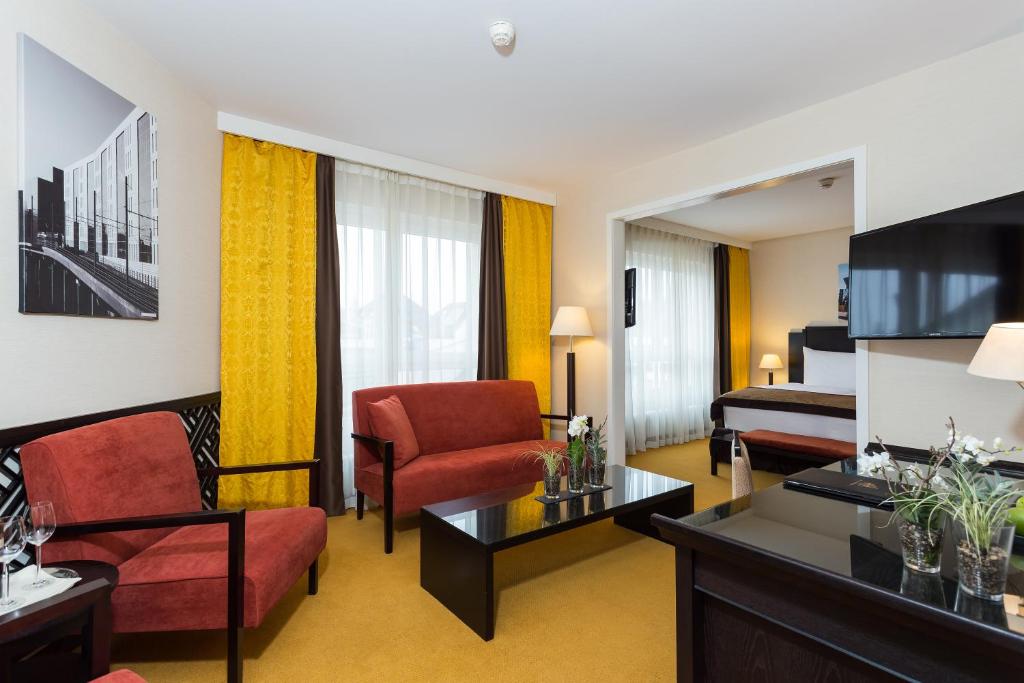 TV a/nebo společenská místnost v ubytování Hotel Euler Basel
