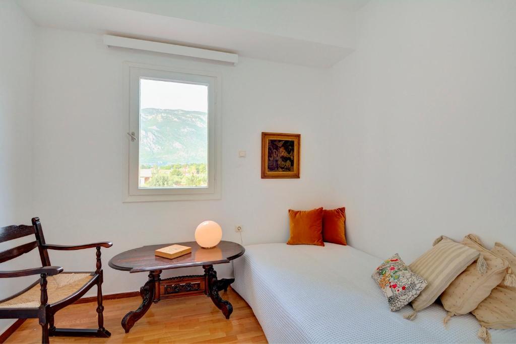 Posteľ alebo postele v izbe v ubytovaní Villa Loutraki Sunset