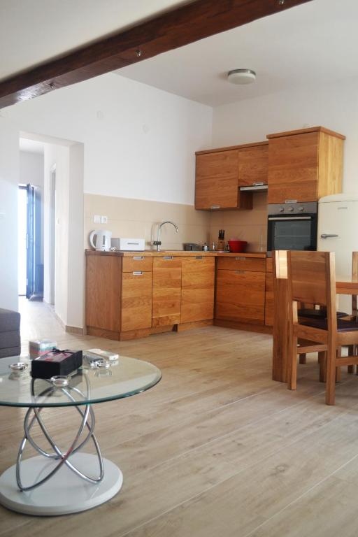 Kuchyň nebo kuchyňský kout v ubytování Apartments Toni Sea view