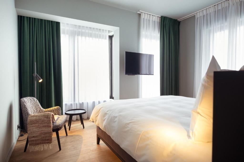 Postel nebo postele na pokoji v ubytování U Eat & Sleep Antwerp