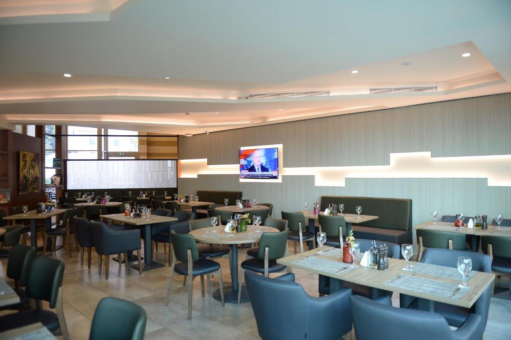 TV a/nebo společenská místnost v ubytování Citea Apart Hotel