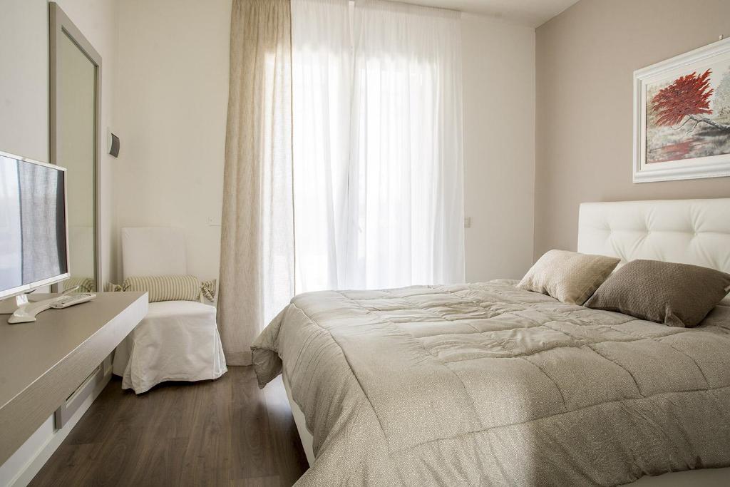 Posteľ alebo postele v izbe v ubytovaní Home Suites Home
