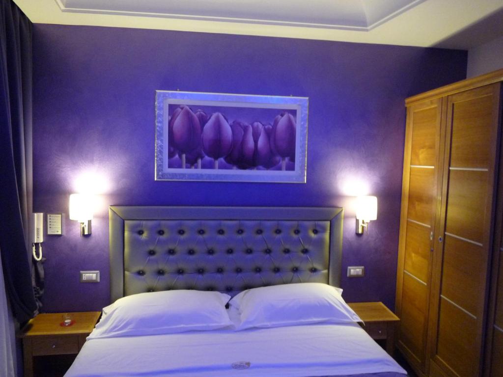 Postel nebo postele na pokoji v ubytování b&b Dea Fortuna