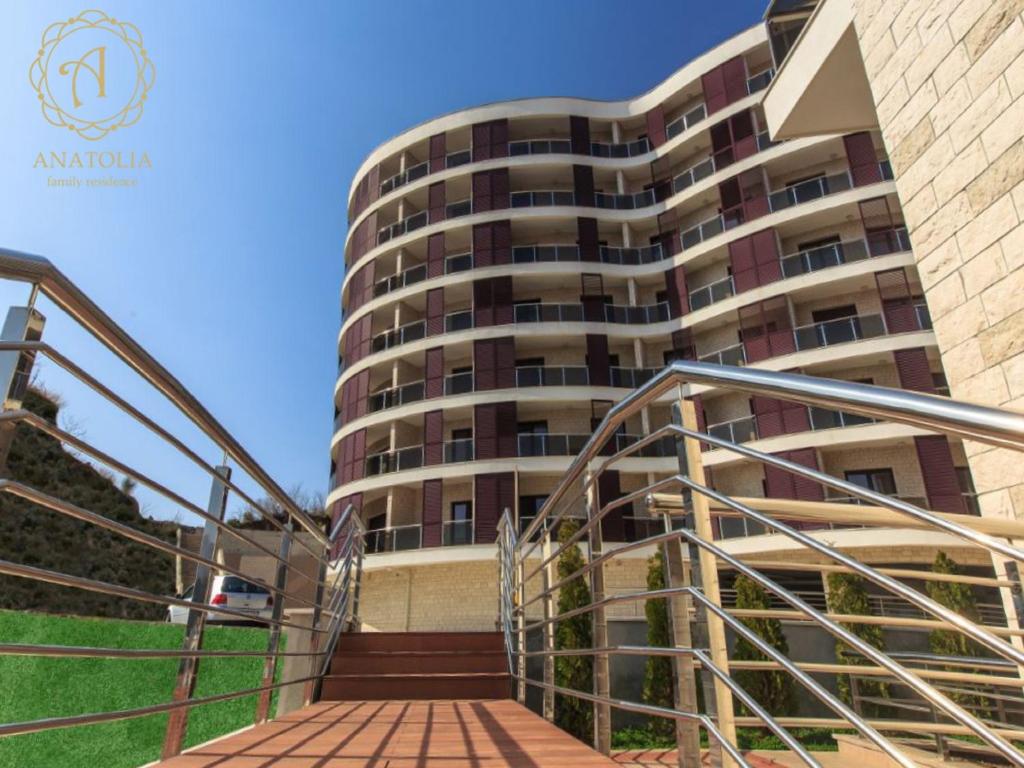 a building with a staircase leading to a building at Apartment Anatolia - Mina in Becici