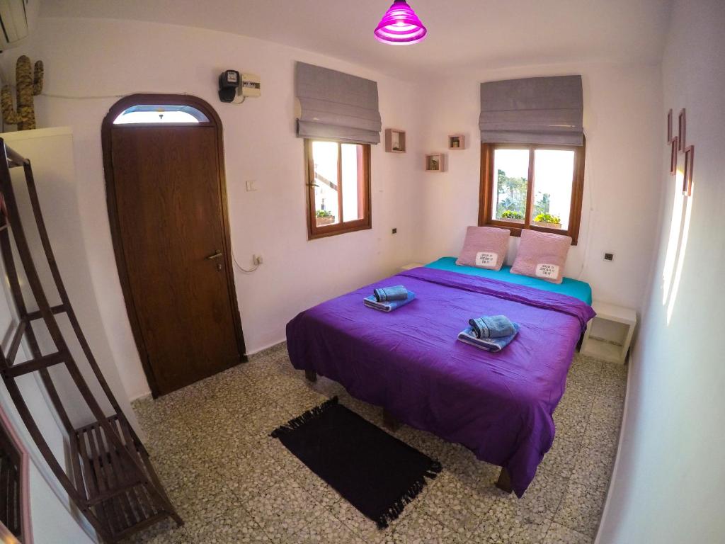 Llit o llits en una habitació de Exodus Hostel & Dive Center