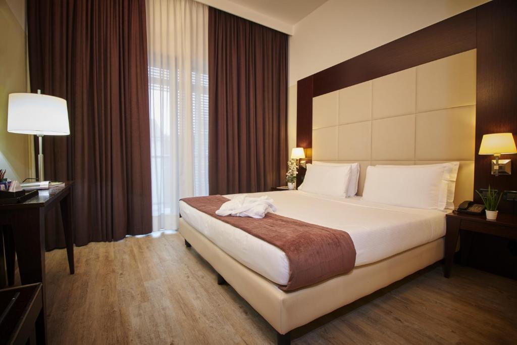 iH Hotels Milano Watt 13客房内的一张或多张床位