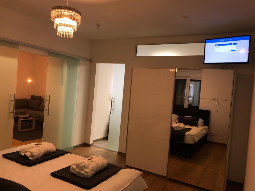 Postel nebo postele na pokoji v ubytování eifel5star - Burgfriedstraße