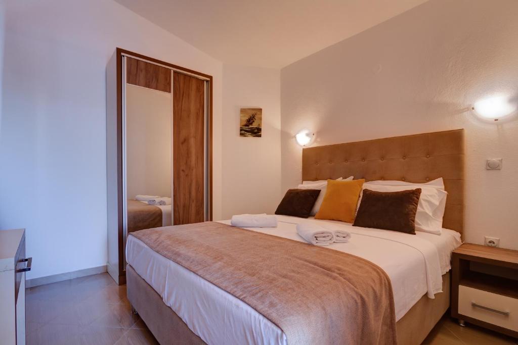 Postel nebo postele na pokoji v ubytování Hotel Zan