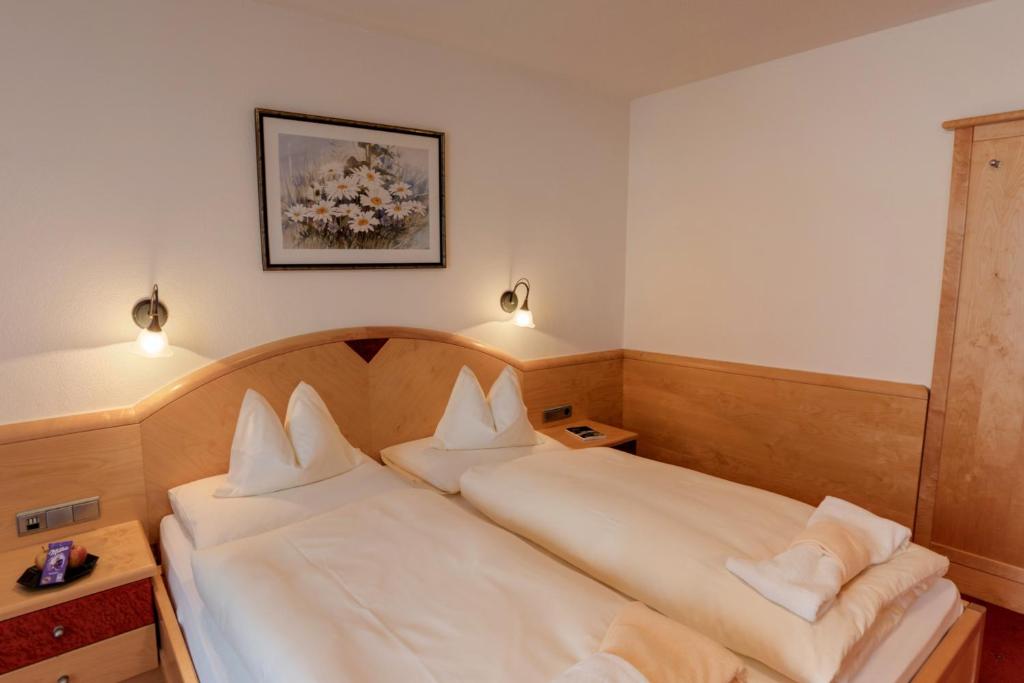 Postel nebo postele na pokoji v ubytování Haus Melitta