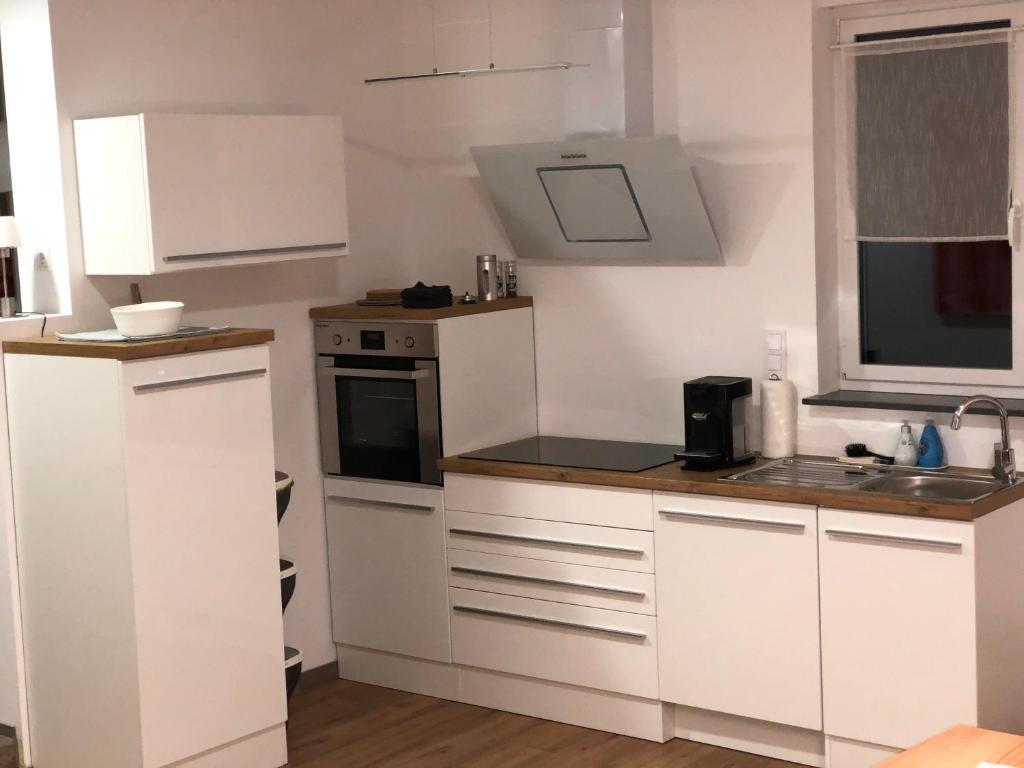 Kuchyň nebo kuchyňský kout v ubytování eifel5star - Burgfriedstraße