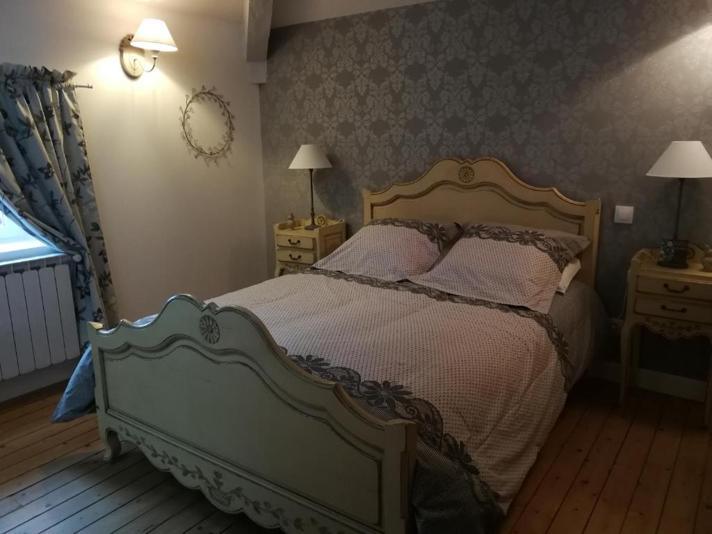 Postel nebo postele na pokoji v ubytování Le Dauphin