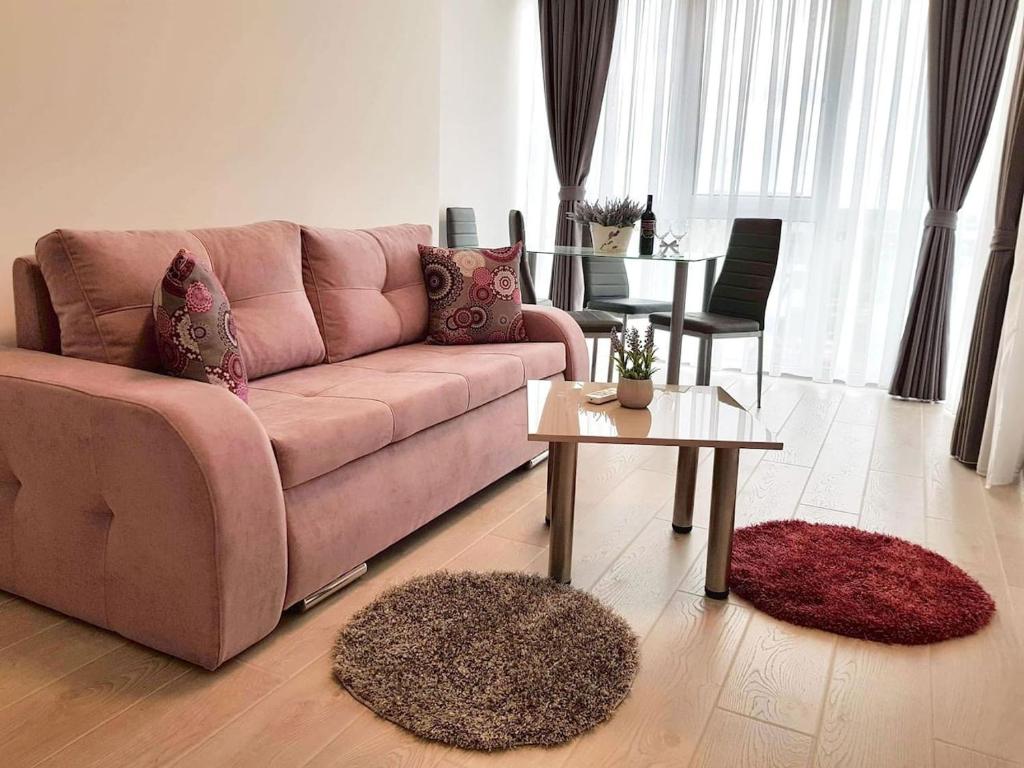 Et sittehjørne på Brand new apartment in Rebreanu Towers Residence