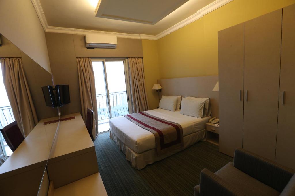 TV a/nebo společenská místnost v ubytování Padova Hotel