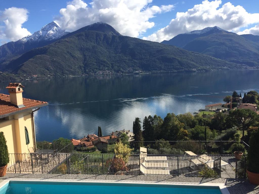 a view of a body of water with mountains at Residenza La Pianca in Musso