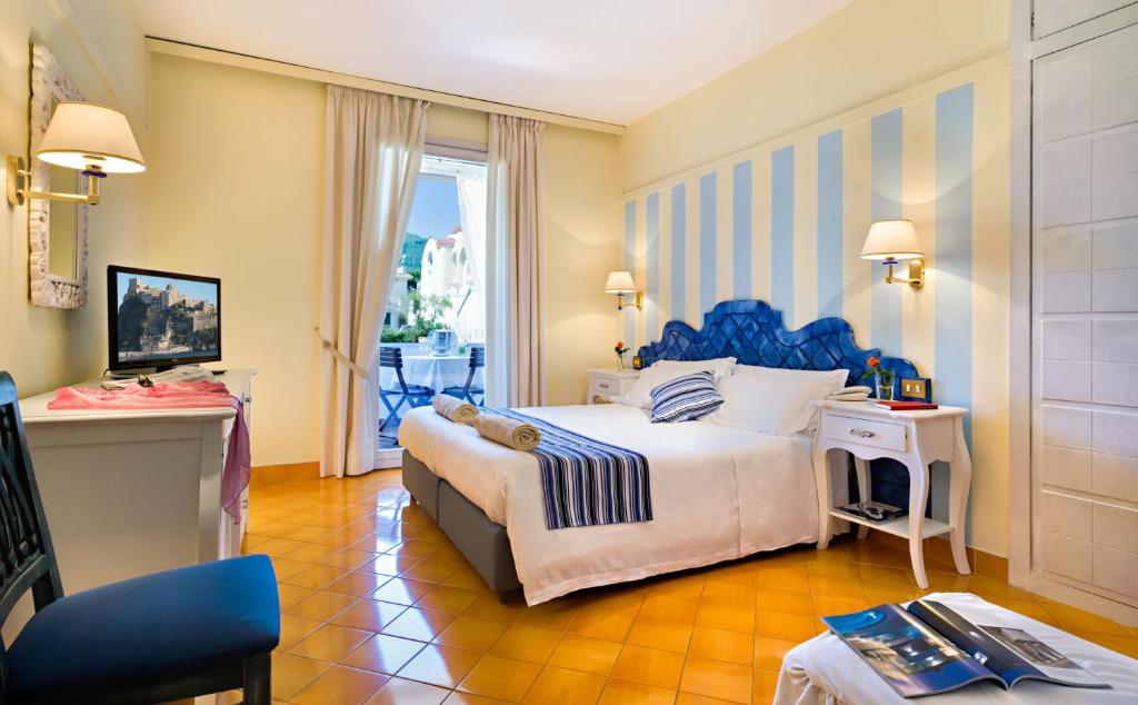 Postel nebo postele na pokoji v ubytování Hotel Mare Blu Terme