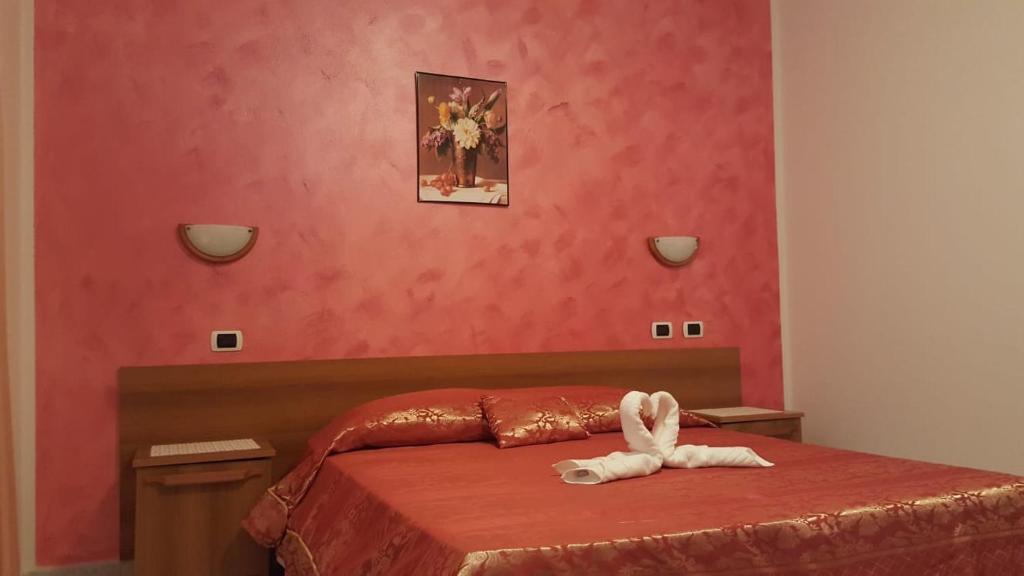 Postel nebo postele na pokoji v ubytování Sogno Sulcitano Masainas